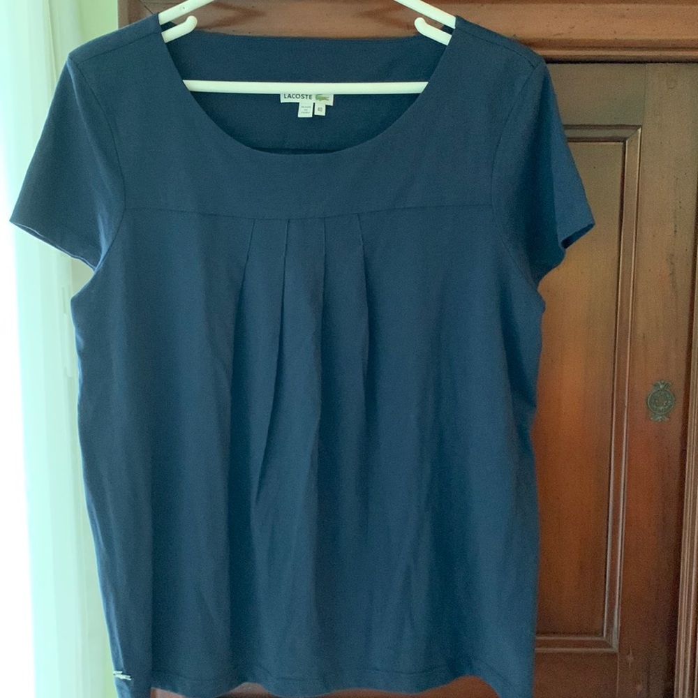 Lacoste short sleeve pleated top size 40.